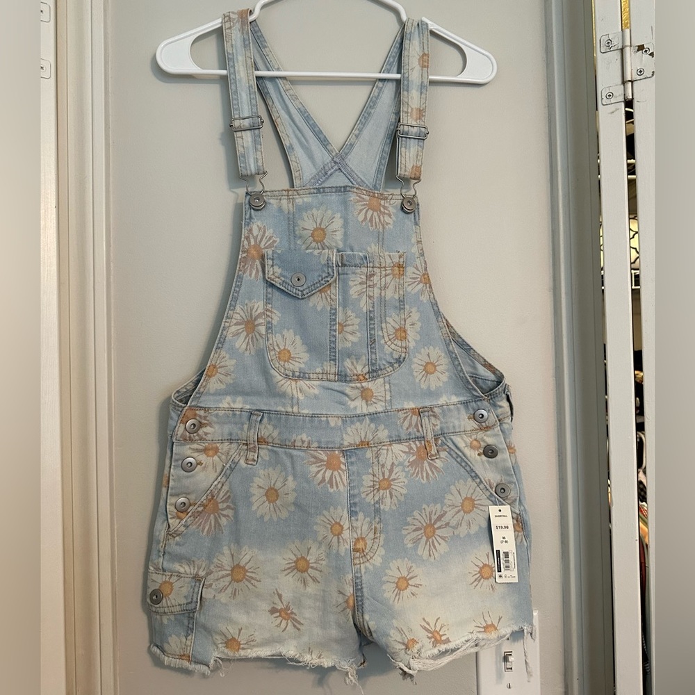 No Boundaries floral faded distressed overalls